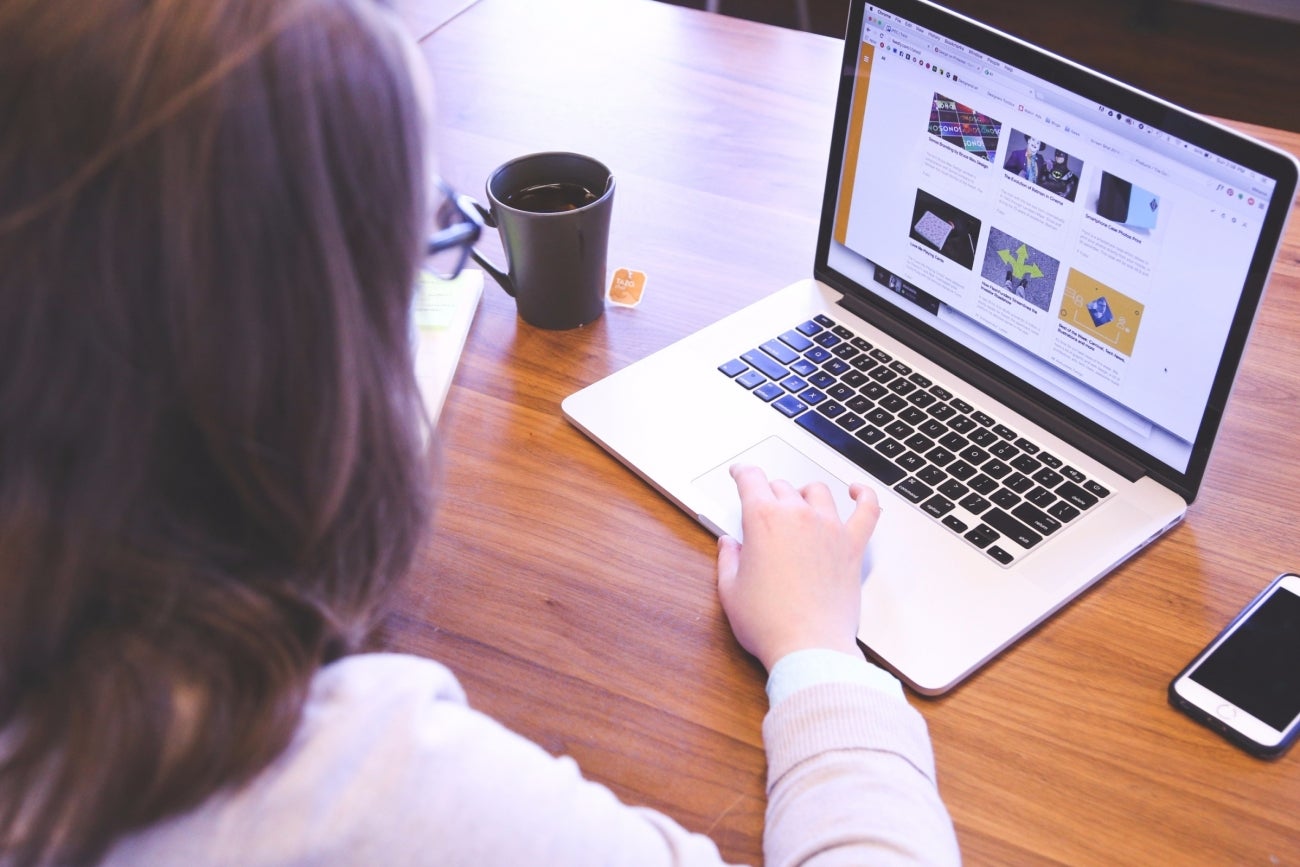 20150824164638-girl-woman-working-macbook-laptop-computer-technology-office-desk-business.jpeg